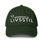 Grön broderad keps med texten adopterade en livsstil från Ohana Rescue framifran snygg hundkeps