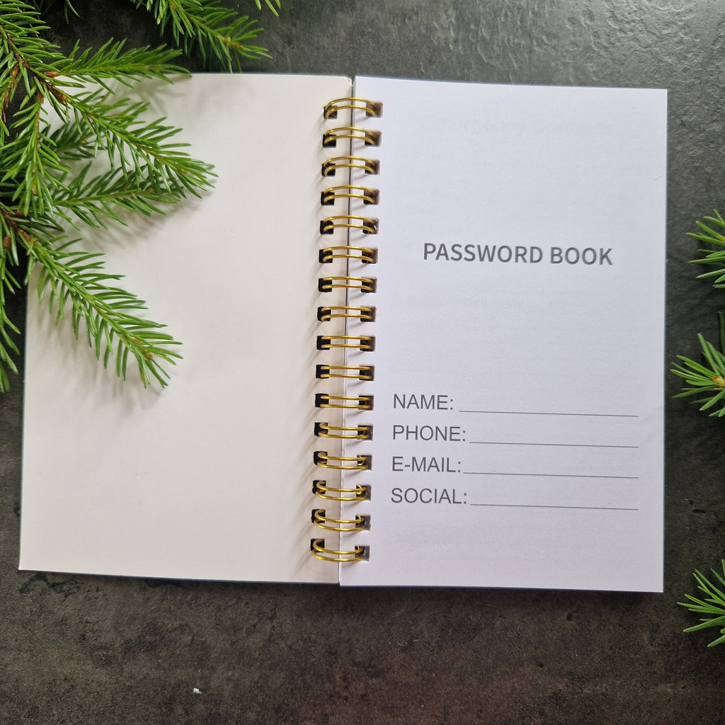 Insida i password book med fält för namn, telefon, e-post och sociala medier